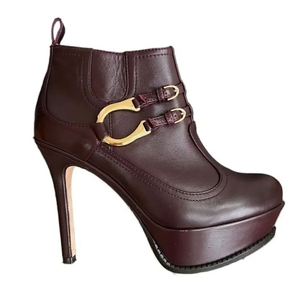 Dione plum Leather high heels platform booties 4.5” Heel 1.5” Platform size 7.5.